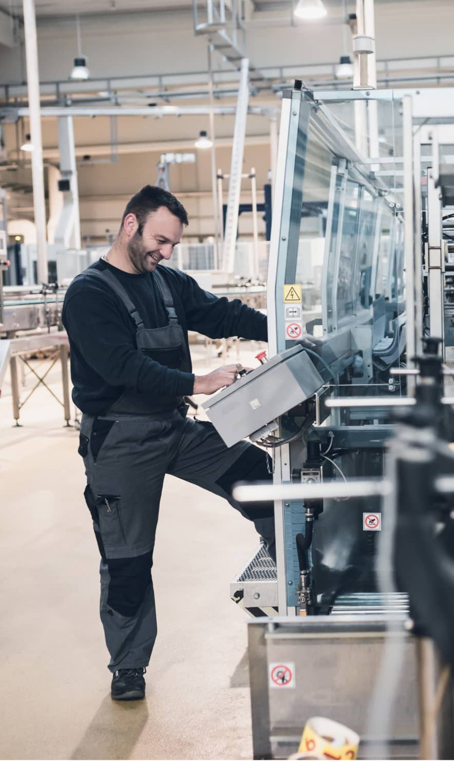 Worker operating a machine